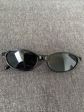 Sleek Black Oval Sunglasses